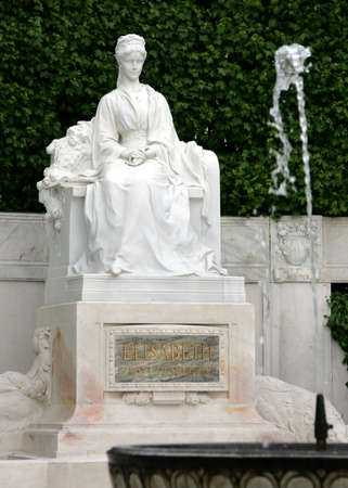 Monument for Empress Elisabeth and fountain before it in the city park in Vienna Austria Stock Photo