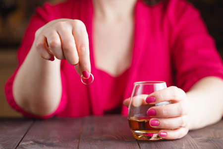 Wife takes off wedding ring