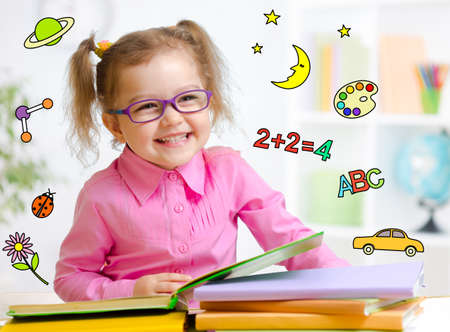 36372502-happy-child-in-glasses-reading-book-early-education-in-kindergarten-concept.jpg
