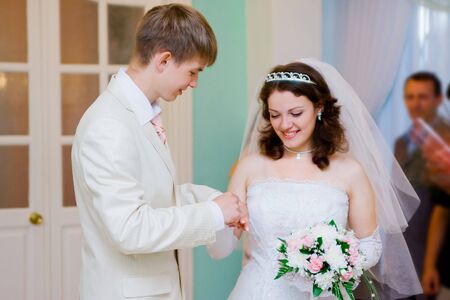 Groom wedding ring finger