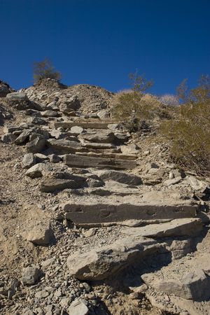 748939-rock-stairs-on-desert-mountain-hiking-trail.jpg