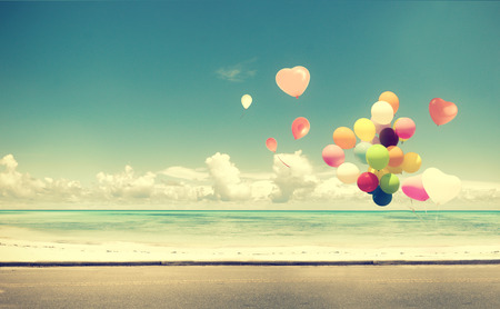 balloon: Vintage  with heart balloon on beach blue sky concept of love in summer and wedding honeymoon