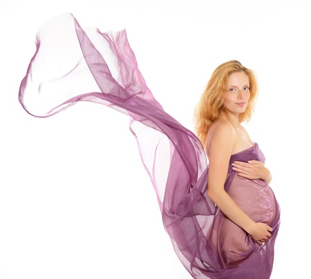 Belle femme enceinte avec une tendre volant tissu violet clair, isolé sur fond blanc Banque d'images - 22024885