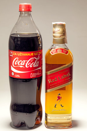 19778497-cacak-serbia--may-20-2013-coca-cola-and-johnnie-walker-whiskey-studio-isolated.jpg