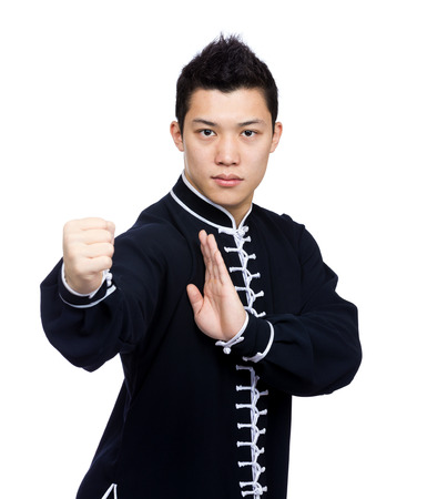 Young Chinese Kung Fu fighter Stock Photo - 26251561