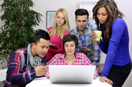 young diverse team of students or employees working