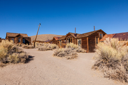 Bodie jest opuszczone miasto na wschodzie Bodie Hills gór Sierra Nevada w Mono County, Kalifornia, Stany Zjednoczone Zdjęcie Seryjne - 27959419