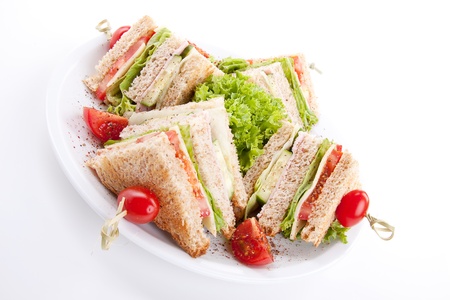 fresh tasty club sandwich with lettuce cheese ham and toast isolated on white background Stock Photo