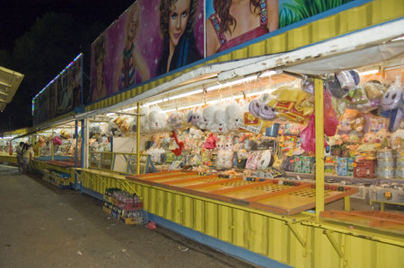 Muar, Johor , August 5, 2010 - the whole row of fun fair game stall which waiting for thier customer