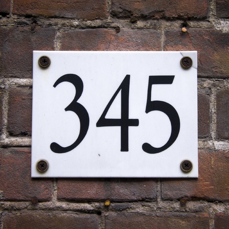 13180854-house-number-345-attached-to-a-brick-wall.jpg