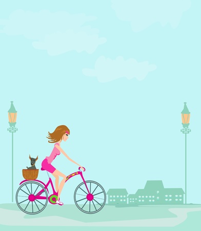 Mujer que monta una bicicleta en la ciudad. Foto de archivo. Mujer que monta una bicicleta en la ciudad. Foto de archivo.