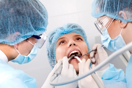 instruments against the backdrop of the open mouth Stock Photo - 14695773