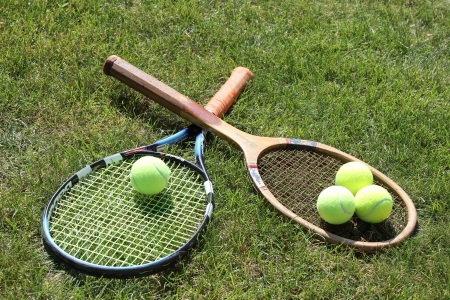 Grass Season Getting Longer From 2015! 15640363-vintage-and-new-tennis-rackets-with-balls-on-grass-court