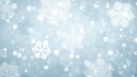 christmas background with white blurred snowflakes on light blue christmas background white