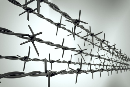 Five strands of new barbed wire forming top of fence on blurred background. - 19611293