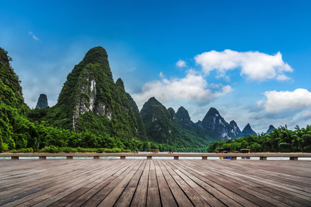 Plank Promenade And Green Mountains And Rivers