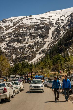Manali, himachal pradesh, india - may 01, 2019 : photo of tourist and vehicle in gulaba. road to rohtang pass in himalayas