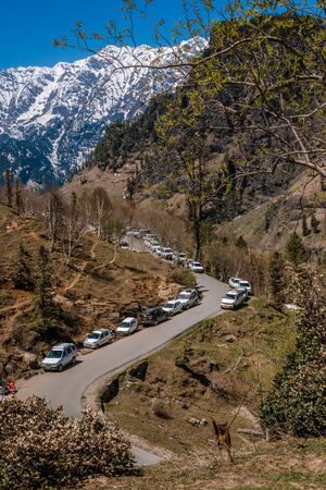 Manali, himachal pradesh, india - may 01, 2019 : photo of tourist and vehicle in gulaba. road to rohtang pass in himalayas