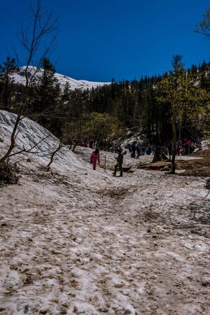 Manali, himachal pradesh, india - may 01, 2019 : tourist enjoying in gulaba. road to rohtang pass in himalayas, india