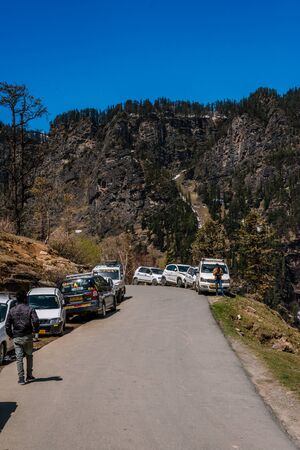 Manali, himachal pradesh, india - may 01, 2019 : photo of tourist and vehicle in gulaba. road to rohtang pass in himalayas