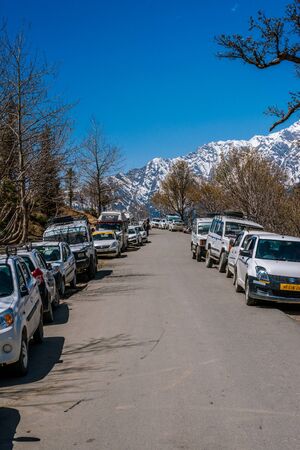 Manali, himachal pradesh, india - may 01, 2019 : photo of tourist and vehicle in gulaba. road to rohtang pass in himalayas