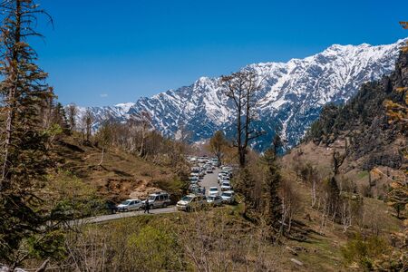 Manali, himachal pradesh, india - may 01, 2019 : photo of tourist and vehicle in gulaba. road to rohtang pass in himalayas