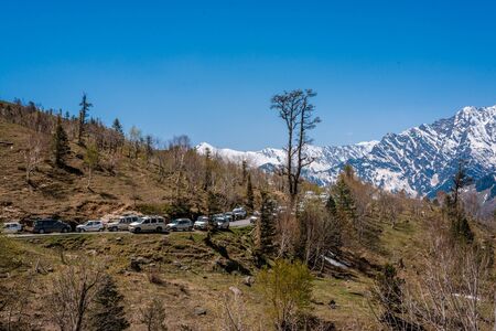 Manali, himachal pradesh, india - may 01, 2019 : photo of tourist and vehicle in gulaba. road to rohtang pass in himalayas