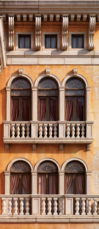 Venetian Gothic arched windows of a house texture in venetian gothic architectural Venetian Gothic arched windows of a house texture in venetian gothic architectural