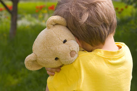boy with bear Фото со стока