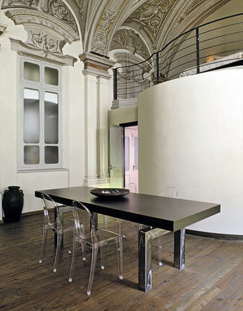 Modern dining room with dining table and wood floor overloking on ...