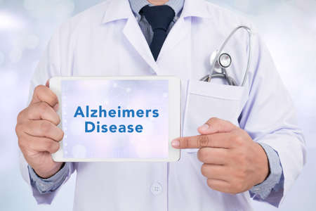 Alzheimers Disease concept Doctor holding digital tablet Stock Photo Alzheimers Disease concept Doctor holding digital tablet Stock Photo - 54955847