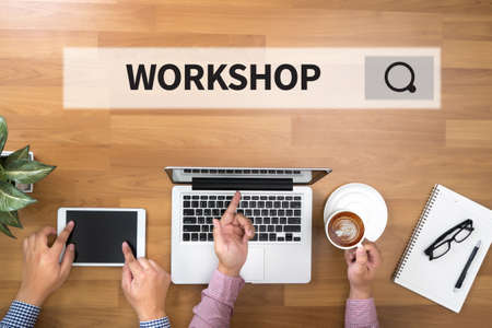 Workshop business strategy and diverse business working online two businessman working at office desk and using a digital touch screen tablet and use computer