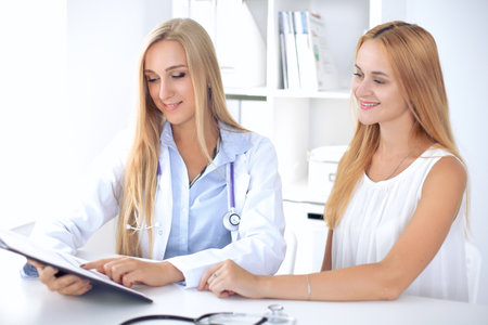 Doctor with patient in hospital