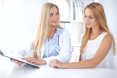 Doctor with patient in hospital