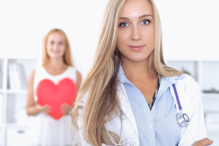 Doctor heart and patient in hospital