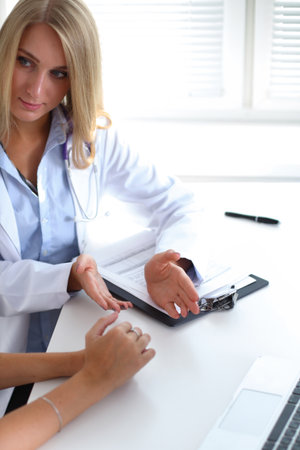 Doctor with patient in hospital