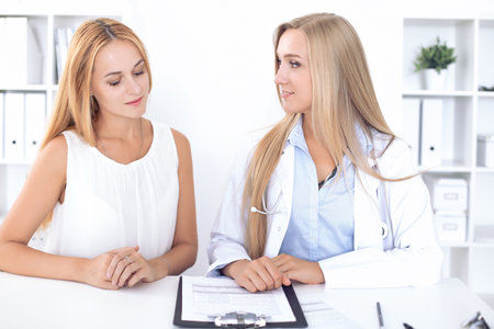 Doctor with patient in hospital