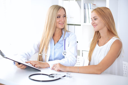 Doctor with patient in hospital