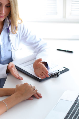 Doctor with patient in hospital