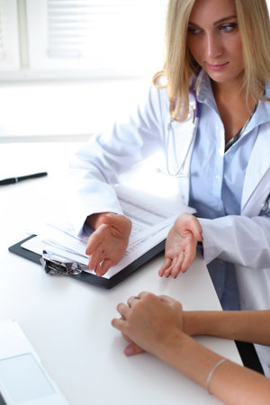 Doctor with patient in hospital