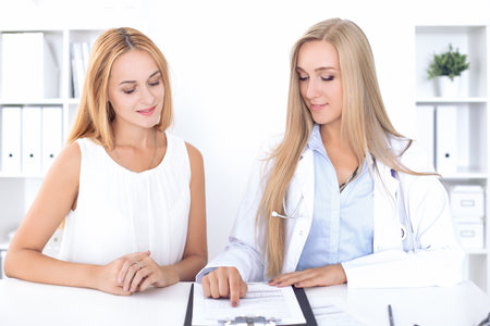 Doctor with patient in hospital