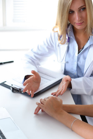 Doctor with patient in hospital