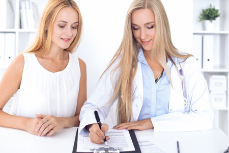 Doctor with patient in hospital