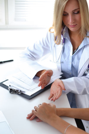 Doctor with patient in hospital