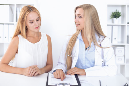 Doctor with patient in hospital