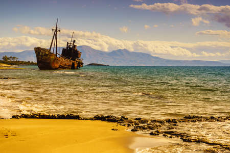 Greek coastline with the famous rusty shipwreck dimitrios in glyfada beach near gytheio, gythio laconia peloponnese greece.