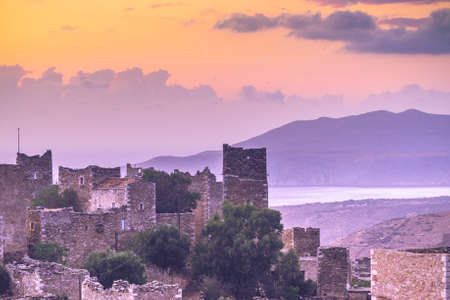 Greece vatheia village at sunset. old abandoned tower houses in vathia mani peninsula in evening time. laconia peloponnese, europe.