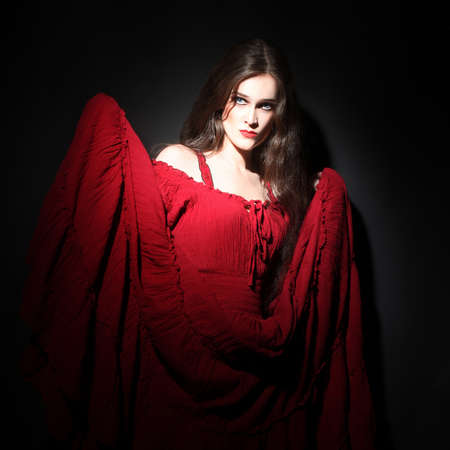 Stock Photo Woman In Red Dress Sexy Model Portrait In Darkness Lady In Red Stock Photo Woman In Red Dress Sexy Model Portrait In Darkness Lady In Red