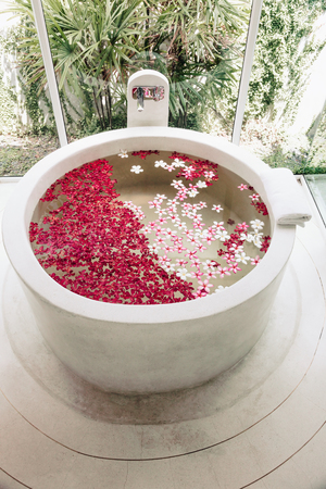 luxury hotel bath with tropical flowers, spa decoration stock luxury hotel bath with tropical flowers, spa decoration stock