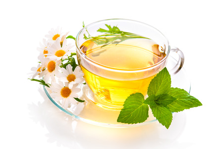 Herbal tea with chamomile and fresh mint leaves